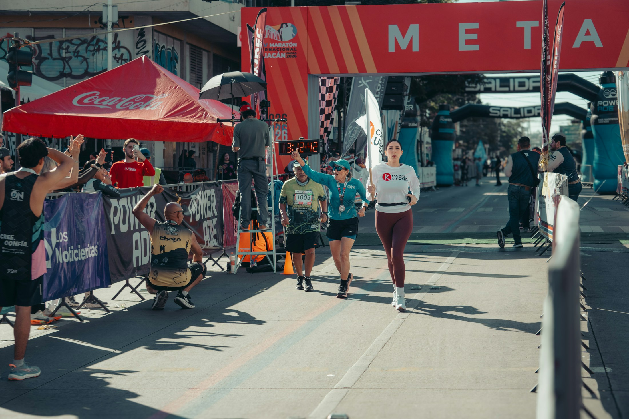 Marathon runners crossing the finish line.